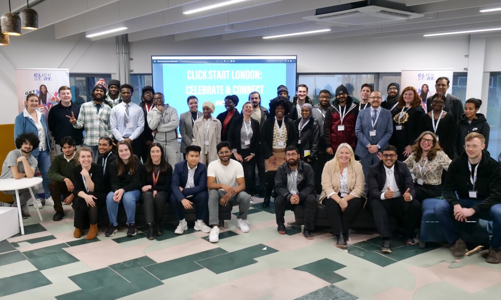 A group photgraph of around 40 people.